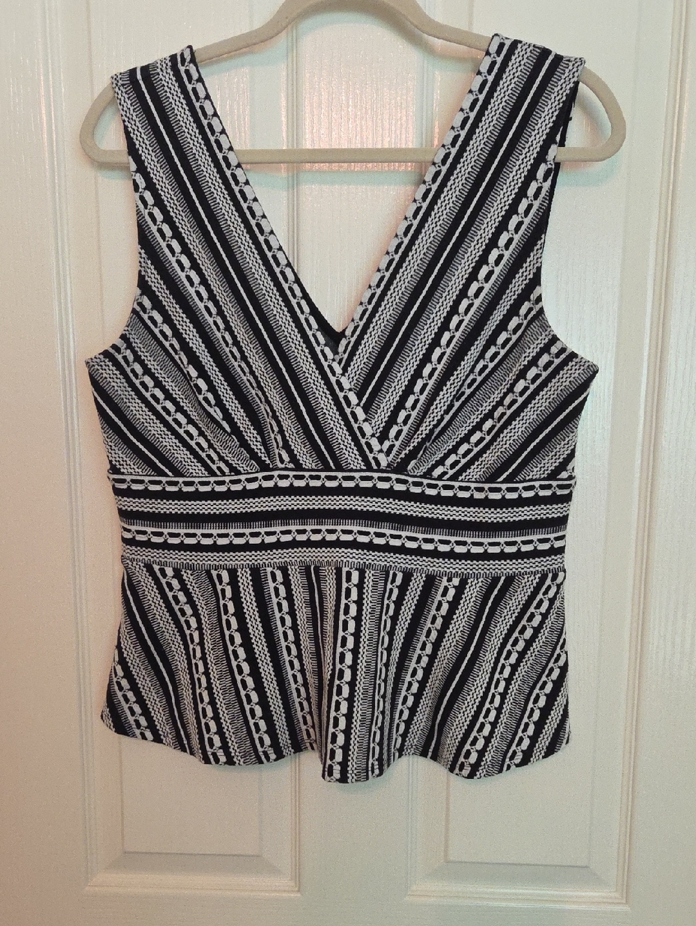 Anthropologie Sleeveless Black and White Striped V-Neck Peplum Top